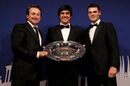 Graeme McDowell, Matteo Manassero and Martin Kaymer pose with the Italian's rookie of the year award
