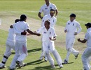 Stuart Broad celebrates taking the wicket of Suranga Lakmal
