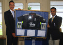 Kevin Pietersen presents ECB disabled cricketer of the year Umesh Valijee with a framed England shirt
