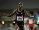 Mo Farah celebrates after winning the 10,000m