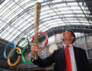 Lord Sebastian Coe unveils the prototype for the Olympic relay torch