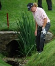 Miguel Angel Jimenez goes in search of his ball