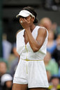 Venus Williams wipes her face