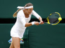 Victoria Azarenka gets her racket on a return