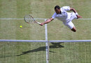 Jo-Wilfried Tsonga dives to reach a volley