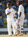 Carlton Baugh and Darren Bravo resisted India's advance