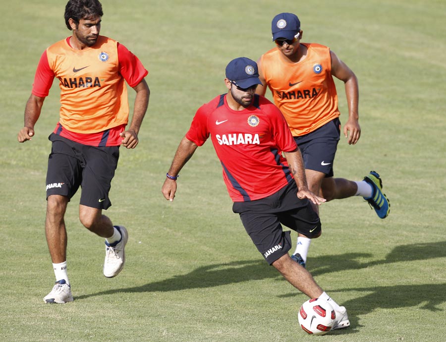 Munaf Patel, Virat Kohli and Suresh Raina play soccer