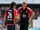 Stuart Broad is given some advice from captain Alastair Cook 