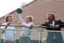 Darren Clarke enjoys his Open victory with his sons Tyrone and Conor