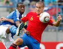 Oriol Romeu challenges for the ball