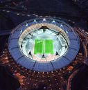 The London 2012 Olympic Stadium is illuminated to mark 'one year to go to the Olympic Games'