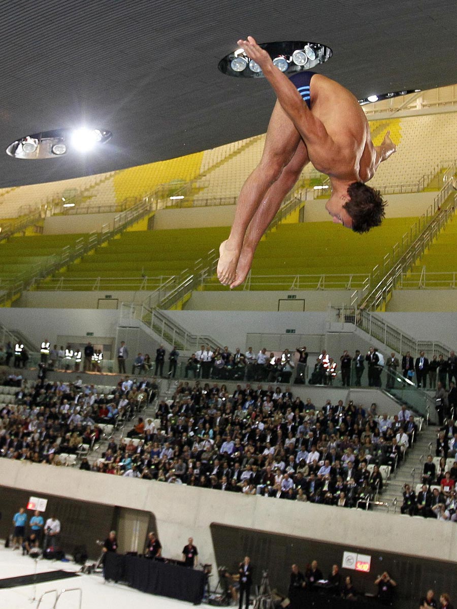 Tom Daley performs a dive into the new Aquatics Centre