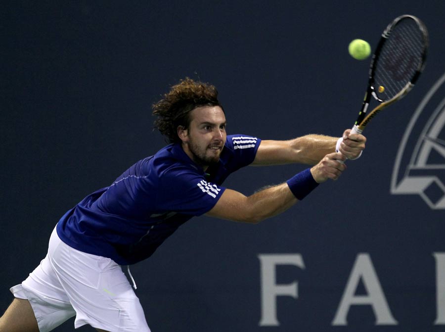 Ernests Gulbis scoops the ball back