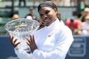 Serena Williams poses with her trophy