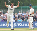 Neil Carter celebrates one of six wickets against Lancashire