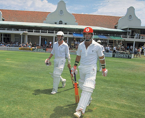 Kevin Arnott and Grant Flower walk out to bat in Zimbabwe's inaugural Test