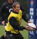 Jonny Wilkinson passes the ball during an England training session