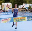 Helen Jenkins crosses the finishing line to win the Dextro Energy Triathlon ITU