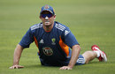 Mike Hussey stretches his back