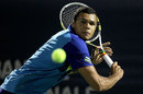Jo-Wilfried Tsonga lunges for a backhand