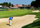 Dustin Johnson plays out of a bunker