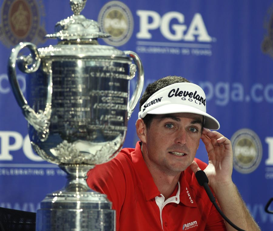 Keegan Bradley answers questions during a news conference 
