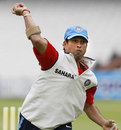 Sachin Tendulkar lines up a throw