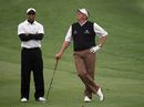 Tiger Woods and Colin Montgomerie play the waiting game