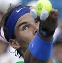Rafael Nadal serves against Fernando Verdasco