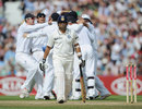 Sachin Tendulkar walks off after being trapped lbw for 91