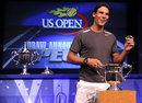 Rafael Nadal assists with the women's draw