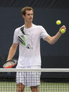 Andy Murray catches a ball during a training session
