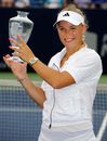 Caroline Wozniacki poses with her trophy