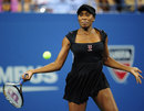 Venus Williams launches into a forehand