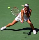 Caroline Wozniacki hits an unorthodox return