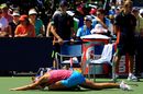 Yanina Wickmayer stretches out her back