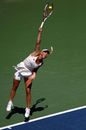 Caroline Wozniacki reaches up for a serve