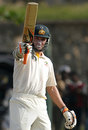 Michael Hussey took Australia past 200 with a battling fifty