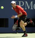 Andy Murray tracks down a forehand