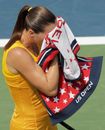 Jelena Jankovic buries her head in a towel