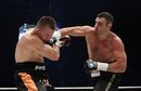 Vitali Klitschko lands a right hook on Tomasz Adamek