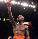 Floyd Mayweather Jr salutes after his victory