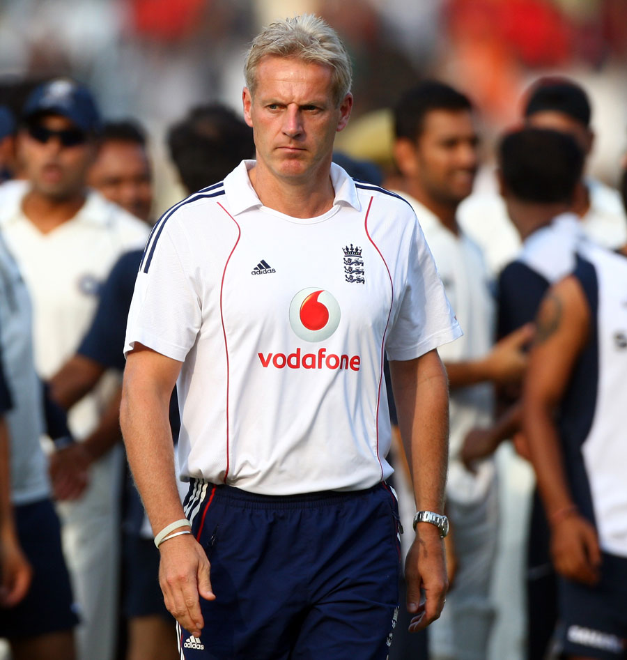 Peter Moores walks off the pitch, 