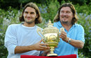 Roger Federer poses with coach Peter Lundgren