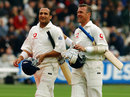 Mark Butcher and Alec Stewart walk off for lunch