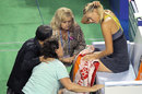 Maria Sharapova receives treatment on an ankle injury