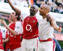 Thierry Henry and Patrick Vieira celebrate