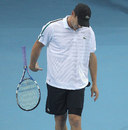Andy Roddick throws his racket in frustration