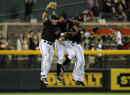 Gerardo Parra, Chris Young and Justin Upton celebrate victory