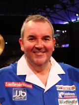 Phil Taylor pictured after beating Simon Whitlock in the final of the World Darts Championship